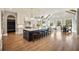 Gourmet kitchen with an island, vaulted ceilings, and an open layout at 3669 High Green Dr, Marietta, GA 30068