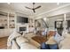 Comfortable living room with a fireplace, built-in bookshelves, and lots of light at 3669 High Green Dr, Marietta, GA 30068