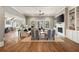Open-concept living room with hardwood floors and access to outdoor living spaces at 3669 High Green Dr, Marietta, GA 30068
