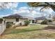 An expansive backyard with a stone patio, offering privacy and outdoor living at 8671 Lake Forrest Dr, Douglasville, GA 30134