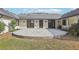 Backyard patio featuring a seating area, perfect for outdoor entertaining at 8671 Lake Forrest Dr, Douglasville, GA 30134