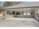Attached carport featuring brick supports and convenient access to the home's entrance at 8671 Lake Forrest Dr, Douglasville, GA 30134