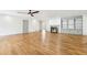 Bright living room with fireplace, built-in shelving and hardwood floors at 8671 Lake Forrest Dr, Douglasville, GA 30134