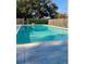 A serene swimming pool with a clear blue water, perfect for summer enjoyment at 8671 Lake Forrest Dr, Douglasville, GA 30134