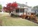 Inviting screened porch and wood deck enhance this home's outdoor appeal at 1191 Crofton Landing, Suwanee, GA 30024