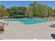 Large community pool featuring lots of seating, perfect for relaxation and enjoying the outdoors at 1191 Crofton Lndg, Suwanee, GA 30024