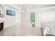 Bright main bedroom with fireplace, TV, and en-suite bath access at 1191 Crofton Lndg, Suwanee, GA 30024