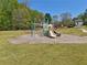 A playground with slides and climbing bars provides a fun place for children to play in this community at 1191 Crofton Lndg, Suwanee, GA 30024