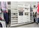 Spacious walk-in closet with custom shelving and organization system at 1191 Crofton Lndg, Suwanee, GA 30024