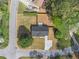 Aerial view of the home showcasing its location, landscaping, and surrounding neighborhood at 1857 Taffeta Trl, Lithonia, GA 30058