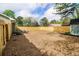 This large lot offers a new fence for privacy and space for outdoor activities or entertainment at 1857 Taffeta Trl, Lithonia, GA 30058