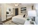 Comfortable bedroom featuring a modern decor, hardwood floors, and lots of light at 1857 Taffeta Trl, Lithonia, GA 30058