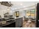 Spacious eat-in kitchen with stainless steel appliances, and granite countertops at 1857 Taffeta Trl, Lithonia, GA 30058