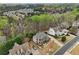 Aerial view of a home in a lush, green neighborhood at 1870 Marcia Overlook Dr, Cumming, GA 30041
