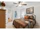 Relaxing bedroom with stylish decor, natural light, and access to a bathroom at 1870 Marcia Overlook Dr, Cumming, GA 30041