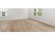 Bedroom with lots of natural light and wood-look flooring at 321 Daybreak Dr, Acworth, GA 30102
