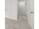 The hallway features neutral colored carpet, white walls, and doorways at 321 Daybreak Dr, Acworth, GA 30102