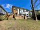 Backyard with a wooden deck and grassy area at 438 Holly Nw St, Atlanta, GA 30318