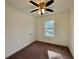 Cozy bedroom featuring neutral carpet and bright natural light at 438 Holly Nw St, Atlanta, GA 30318