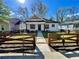 Charming home featuring a manicured front yard, sidewalk, and inviting entrance at 438 Holly Nw St, Atlanta, GA 30318