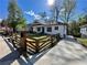 Charming bungalow with a well-maintained yard, landscaping and wooden fence at 438 Holly Nw St, Atlanta, GA 30318