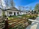 Charming home with fresh curb appeal, landscaping and a quaint fence at 438 Holly Nw St, Atlanta, GA 30318