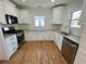 Bright kitchen with stainless steel appliances and granite countertops at 438 Holly Nw St, Atlanta, GA 30318