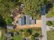 An aerial view shows the property with mature trees and road access at 717 Chamberlain Sw Cir, Marietta, GA 30008