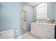 Bathroom featuring a vanity with white cabinets and marble floors at 717 Chamberlain Sw Cir, Marietta, GA 30008