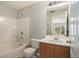 Clean bathroom with a shower-tub combo and vanity at 13304 Waldrop Cv, Decatur, GA 30034