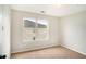 Comfortable bedroom featuring a large window at 13304 Waldrop Cv, Decatur, GA 30034
