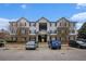 Well-maintained apartment building featuring traditional architectural details and convenient parking spaces at 13304 Waldrop Cv, Decatur, GA 30034