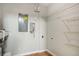 Utility room with shelving for storage and a connection for a washing machine at 13304 Waldrop Cv, Decatur, GA 30034