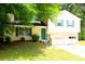 Traditional home with a cozy entrance and a convenient two-car garage at 2238 Scarbrough Dr, Stone Mountain, GA 30088
