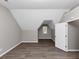 Charming bedroom with a vaulted ceiling, hardwood floors, a window, and plenty of space at 7746 New Castle Way, Jonesboro, GA 30236