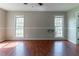 Bedroom featuring updated floors, neutral paint and ample natural light at 116 Shefield Pl, Douglasville, GA 30134