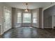 Cozy breakfast nook featuring a bay window, neutral paint, and vinyl flooring at 116 Shefield Pl, Douglasville, GA 30134
