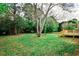 Large backyard with mature trees and green space at 1741 Hasty Rd, Marietta, GA 30062