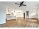 Open-concept living room featuring hardwood floors, stairs, and modern fixtures at 1741 Hasty Rd, Marietta, GA 30062