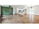 Spacious living room with hardwood floors and white paint, flowing into an open floorplan at 1741 Hasty Rd, Marietta, GA 30062
