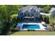 Inviting backyard with a private pool, large deck, and patio perfect for outdoor living and entertaining at 20 Rivercreek Xing, Kingston, GA 30145