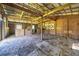 The unfinished barn interior features wooden beams and dividers at 20 Rivercreek Xing, Kingston, GA 30145