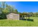 Exterior view of the barn on a grassy field at 20 Rivercreek Xing, Kingston, GA 30145
