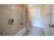 Bright bathroom featuring a shower-tub combination, and a neutral color palette at 20 Rivercreek Xing, Kingston, GA 30145