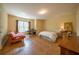 Spacious bedroom with a futon, desk, and tiled floors at 20 Rivercreek Xing, Kingston, GA 30145