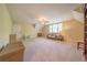 Spacious bonus room, featuring neutral paint, carpet flooring, and a ceiling fan at 20 Rivercreek Xing, Kingston, GA 30145