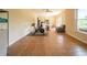 Bonus room with exercise equipment, tile floors, and a comfortable reading chair at 20 Rivercreek Xing, Kingston, GA 30145