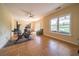Bright exercise room with tile flooring, exercise machines, and a patio door at 20 Rivercreek Xing, Kingston, GA 30145