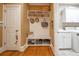 Mud room features built-in storage, bench, and easy access to the laundry area at 20 Rivercreek Xing, Kingston, GA 30145