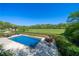 Beautiful in-ground pool with hot tub and scenic views, perfect for relaxation and entertainment at 20 Rivercreek Xing, Kingston, GA 30145